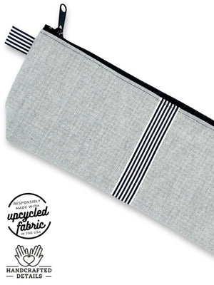 fabric detail of adult toy pouch in light gray denim with black and white ribbon accent , made in USA by  Quiver.Love